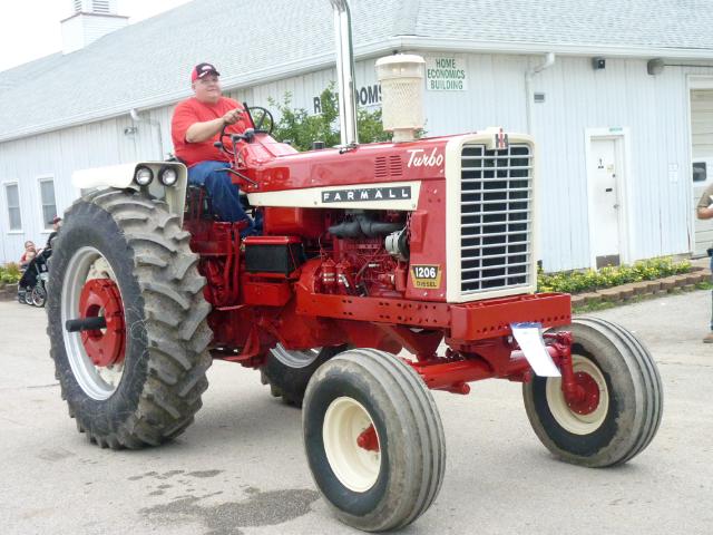 Farmall 1206 Diesel Tractor in Antique Tractor Parade at the fair